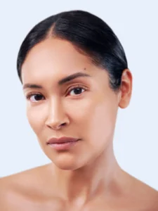 Woman with healthy, glowing skin, representing medical-grade skincare results